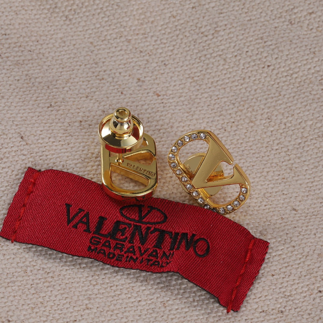 Boucles d'oreilles clous vintage en forme de V sertis de diamants