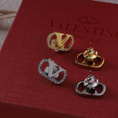 Boucles d'oreilles clous vintage en forme de V sertis de diamants