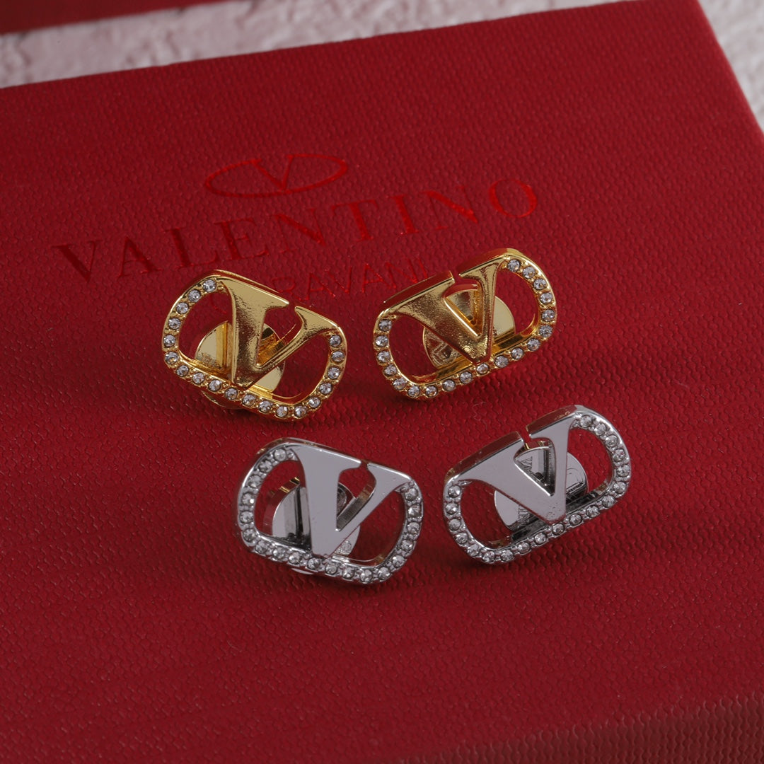 Boucles d'oreilles clous vintage en forme de V sertis de diamants