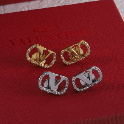 Boucles d'oreilles clous vintage en forme de V sertis de diamants