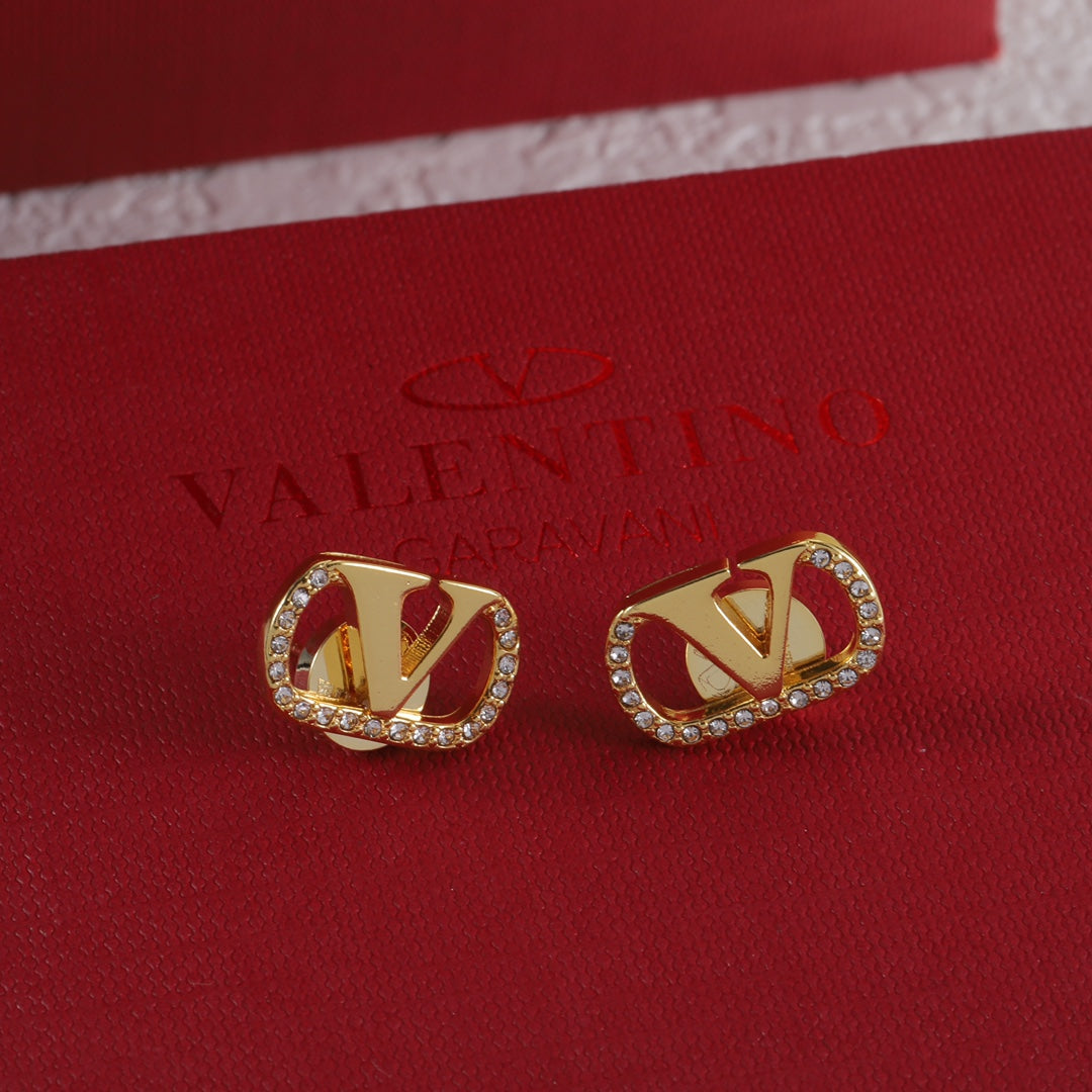 Boucles d'oreilles clous vintage en forme de V sertis de diamants