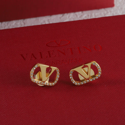 Boucles d'oreilles clous vintage en forme de V sertis de diamants