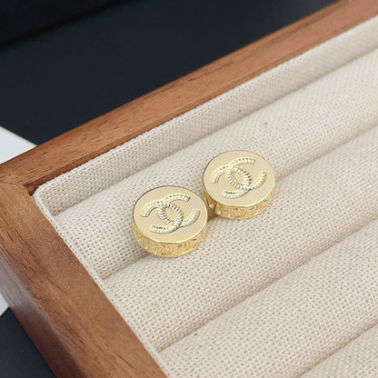 Boucles d'oreilles clous mini rondes en relief doré