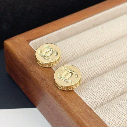 Boucles d'oreilles clous mini rondes en relief doré