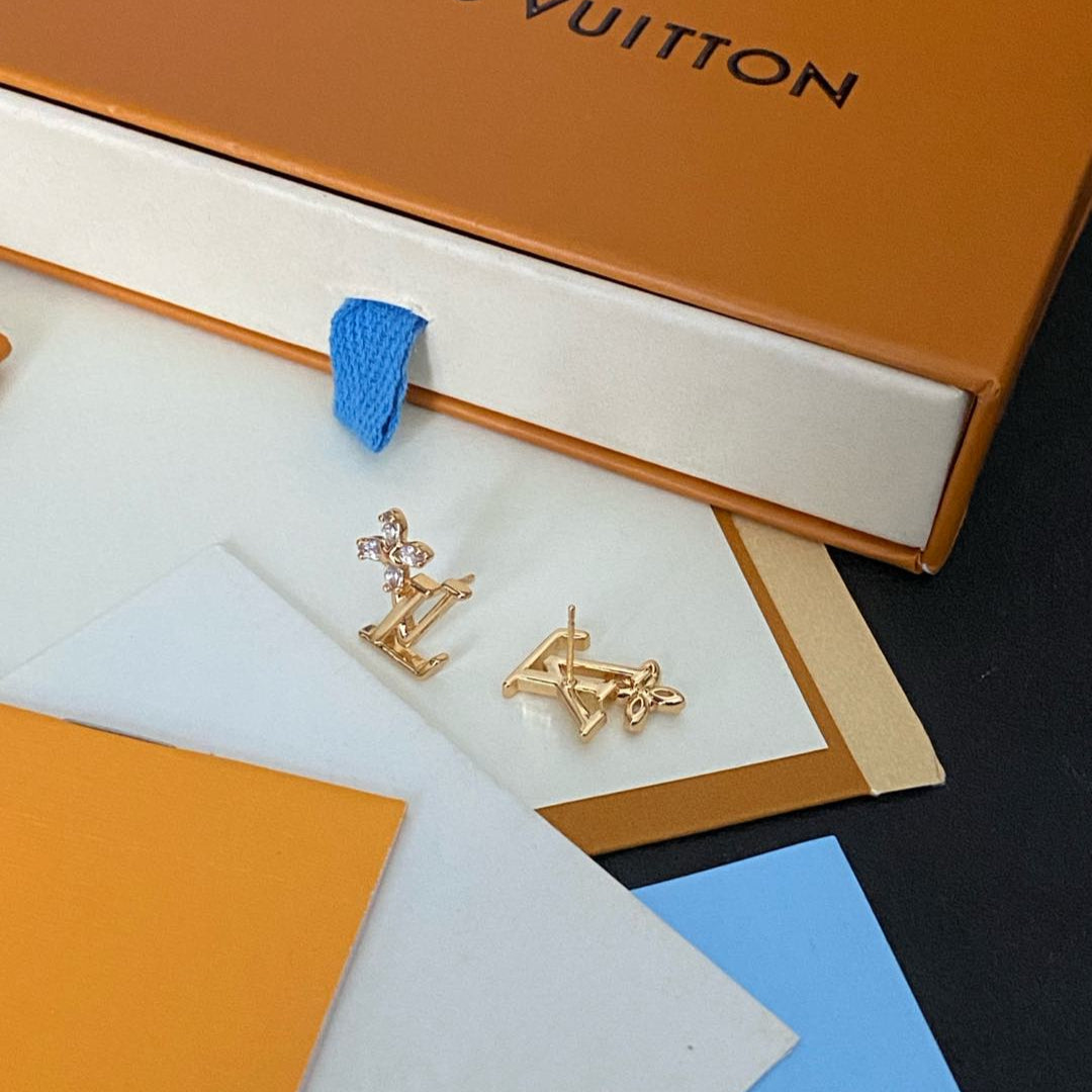Boucles d'oreilles clous élégantes avec logo floral en cristal