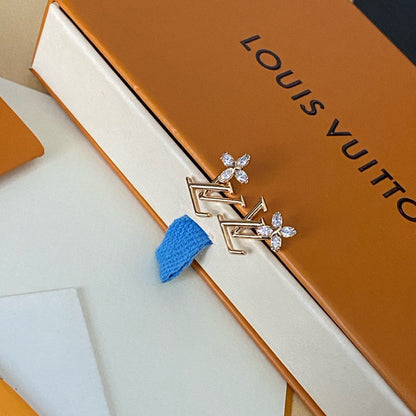 Boucles d'oreilles clous élégantes avec logo floral en cristal
