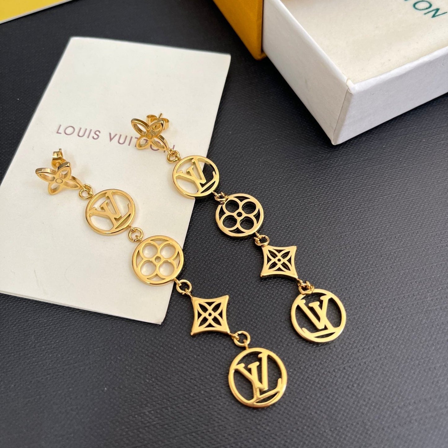 Boucles d'oreilles pendantes florales ajourées