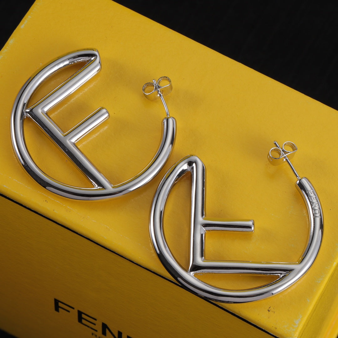 Boucles d'oreilles F demi-créoles vintage