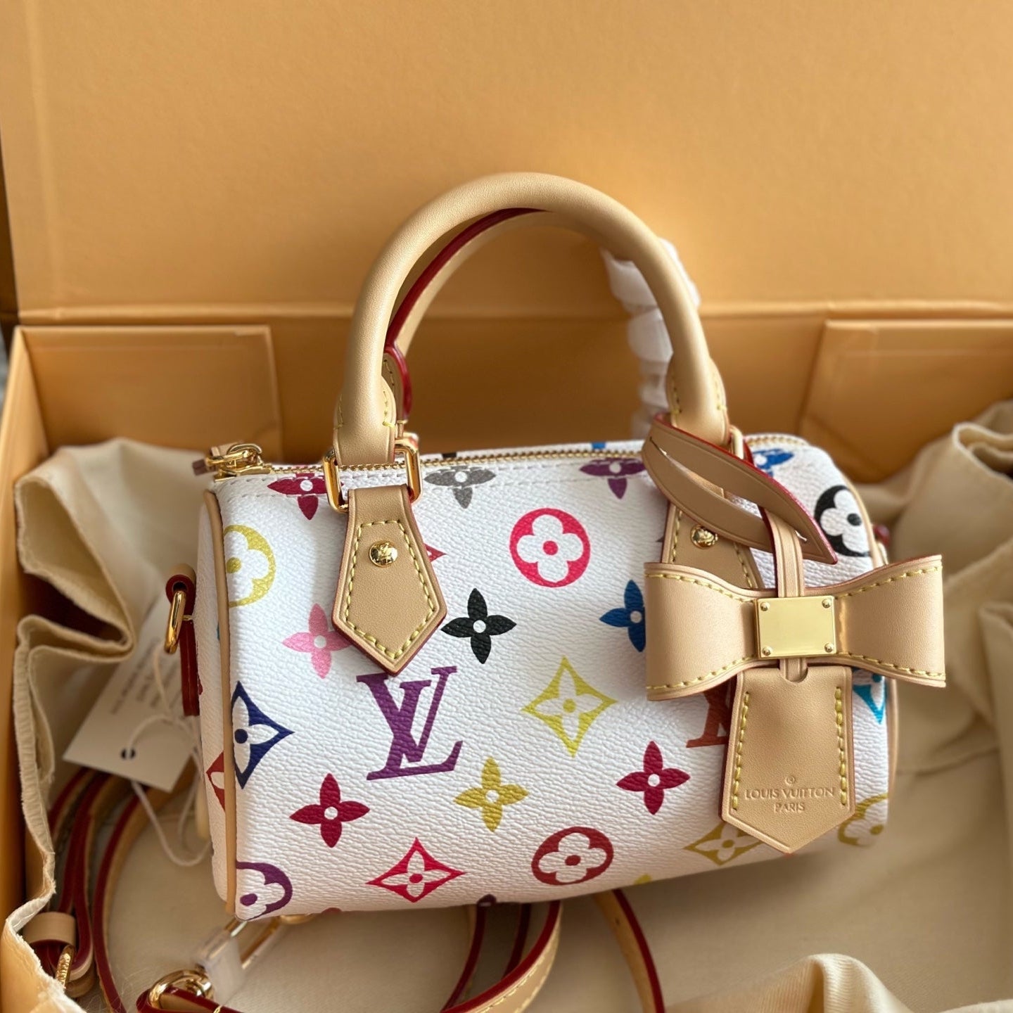 Sac blanc à nœud, gaufré et coloré