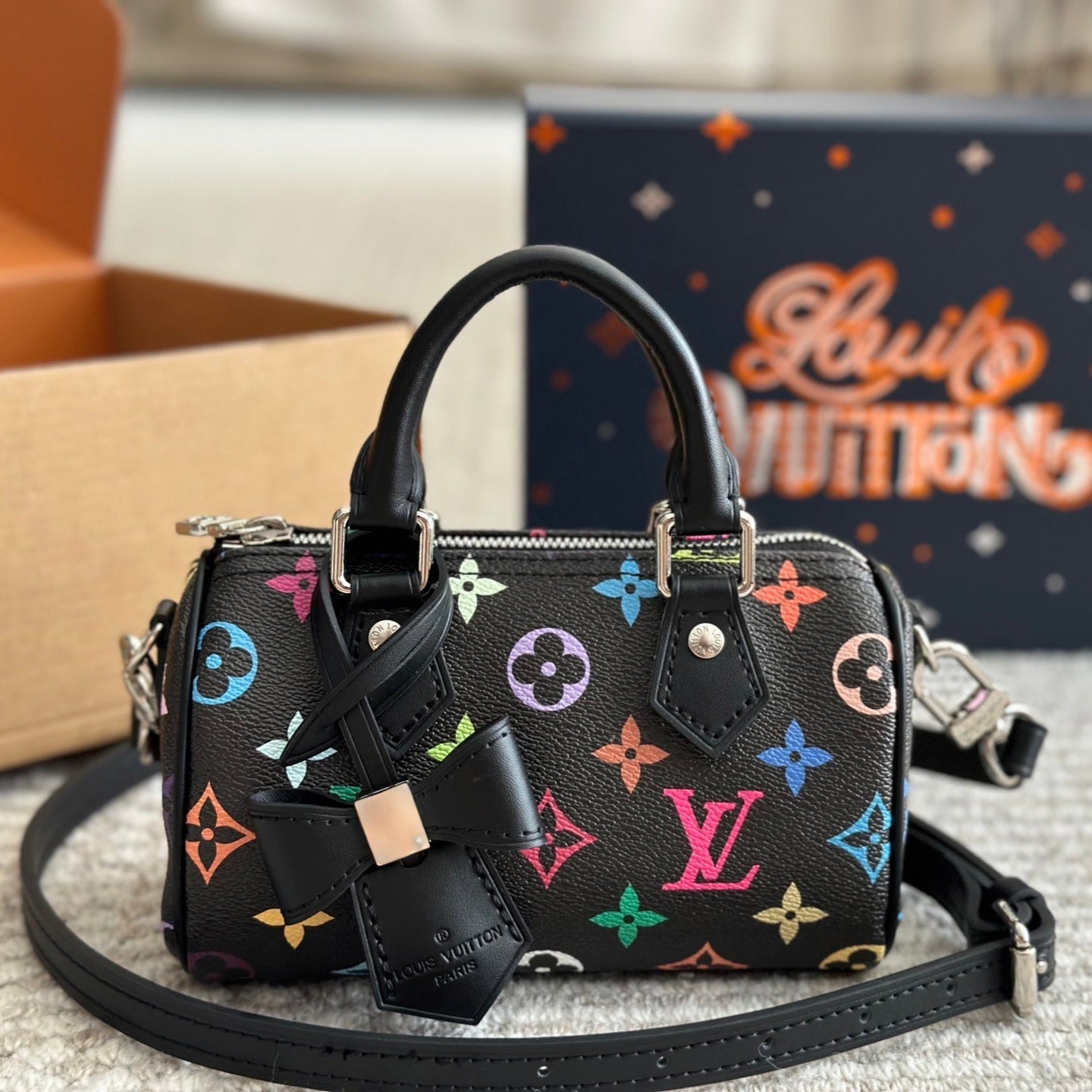 Sac nœud noir gaufré et coloré