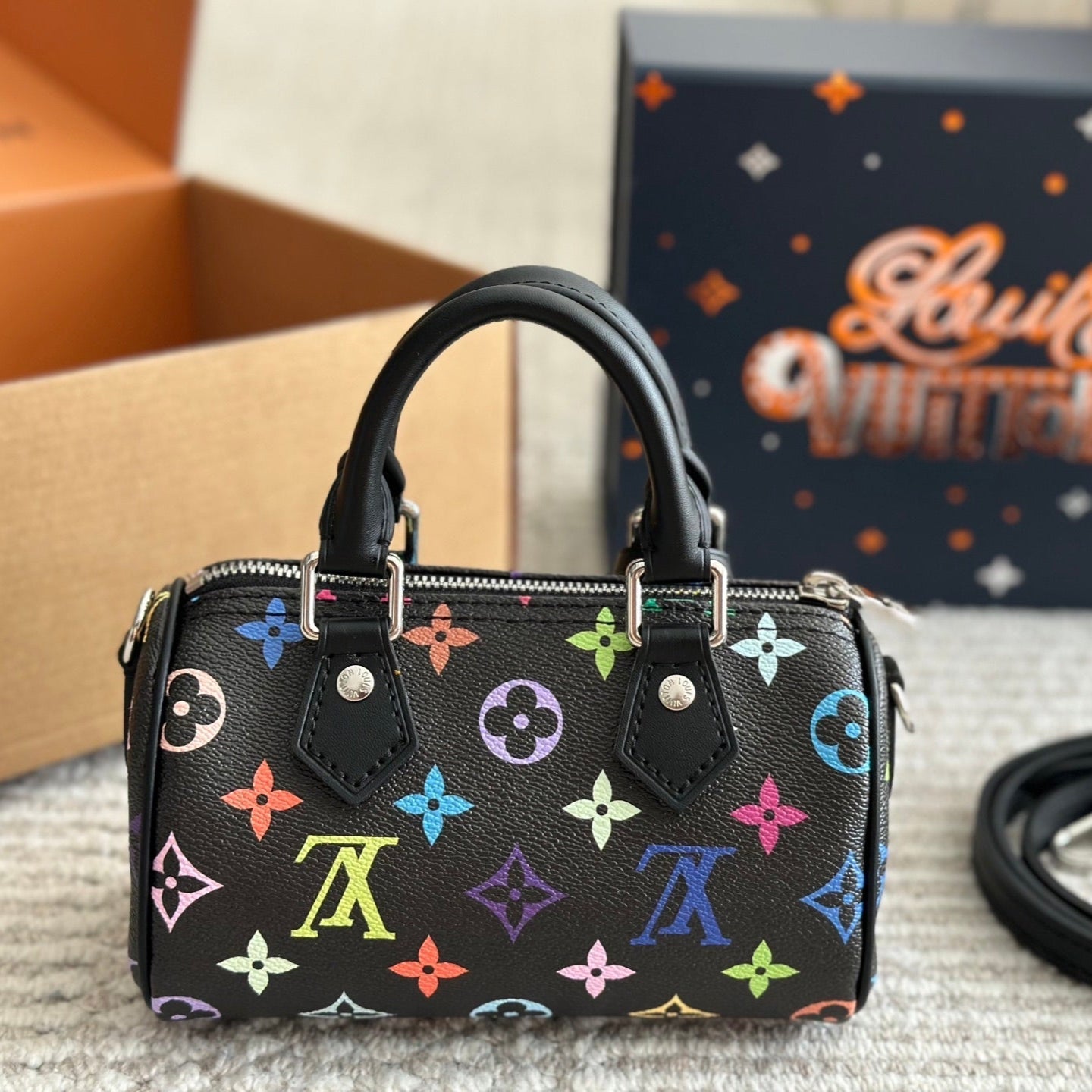 Sac nœud noir gaufré et coloré