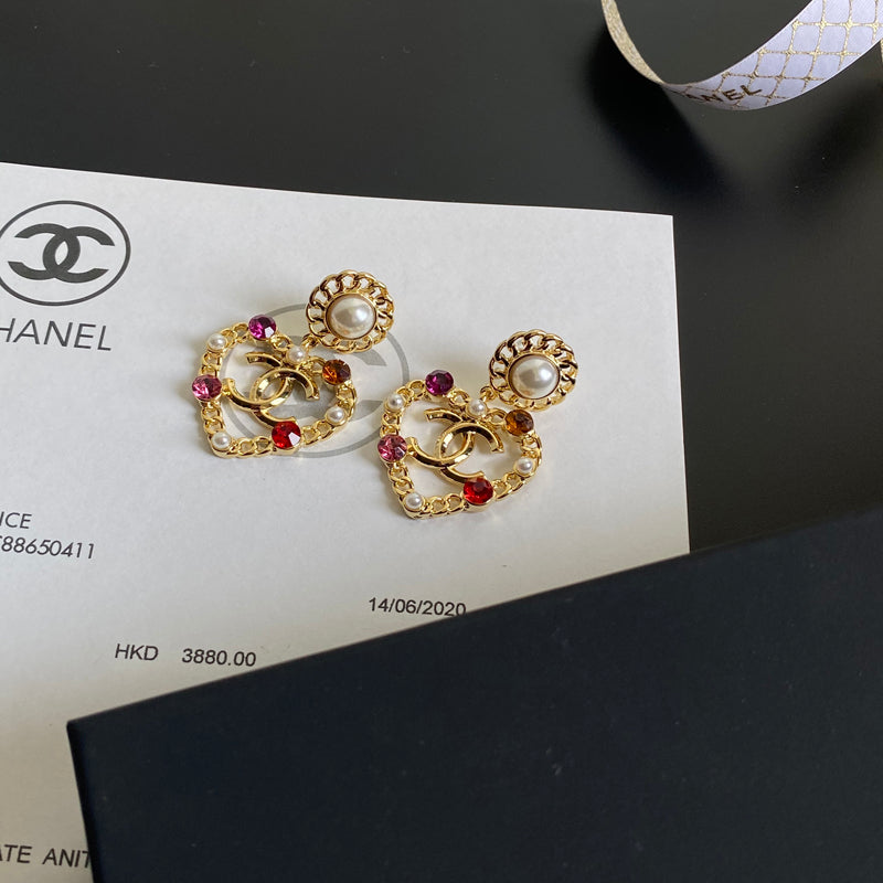 Pendientes con colgante de corazón de gema de cristal