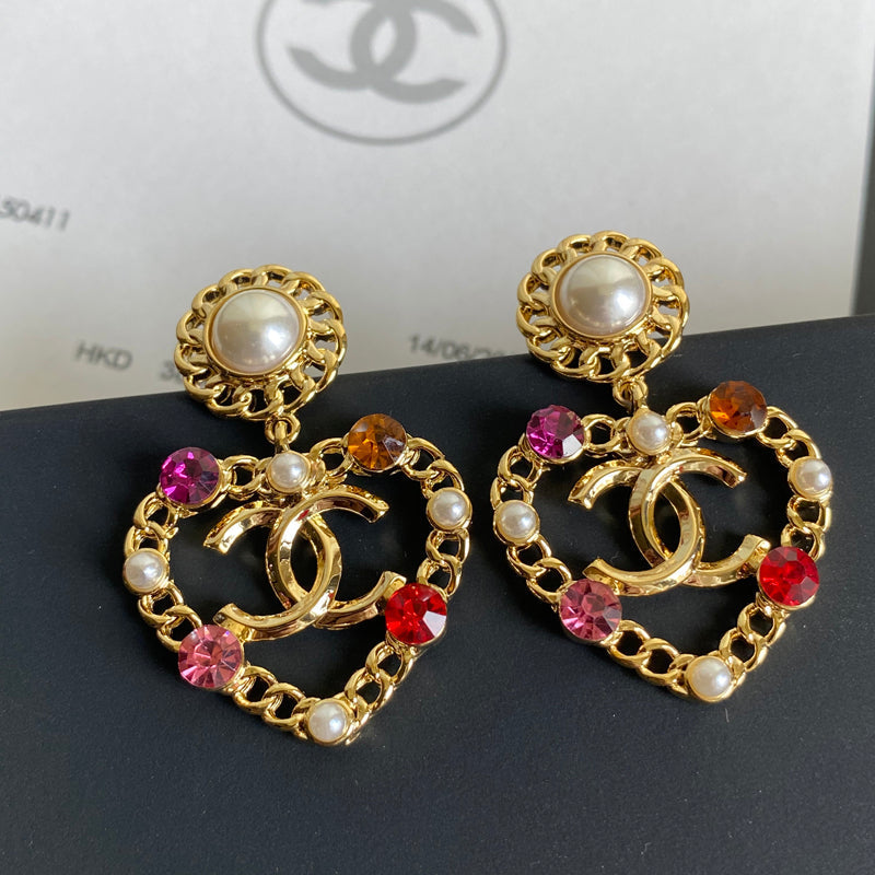 Pendientes con colgante de corazón de gema de cristal