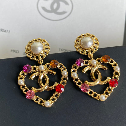 Pendientes con colgante de corazón de gema de cristal