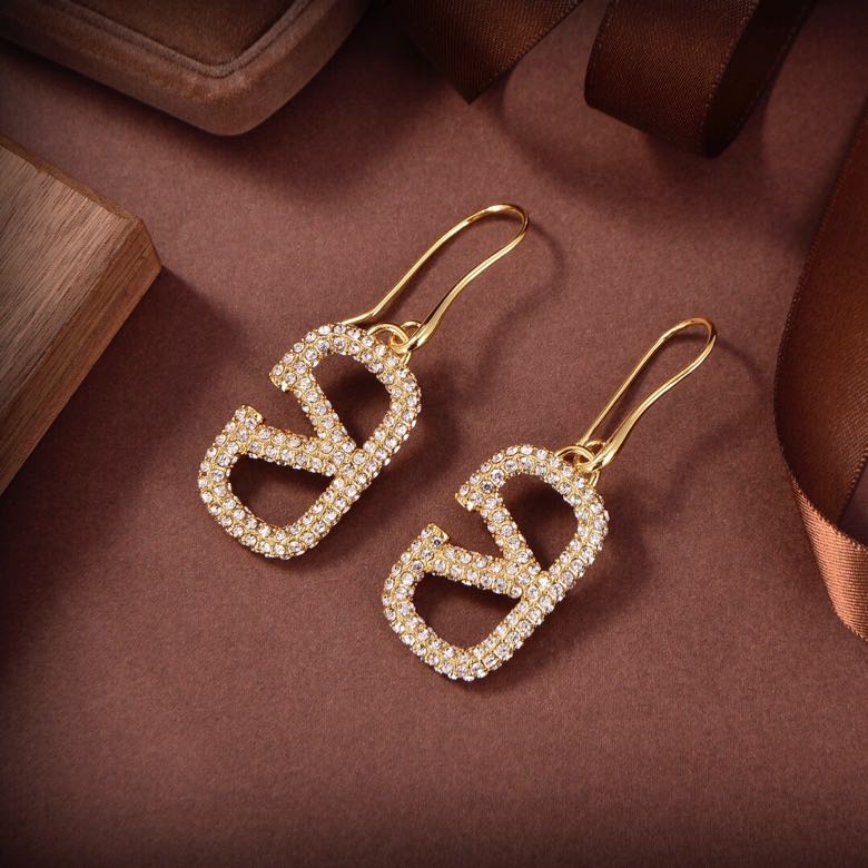 Pendientes metálicos Signature con logo totalmente de diamantes