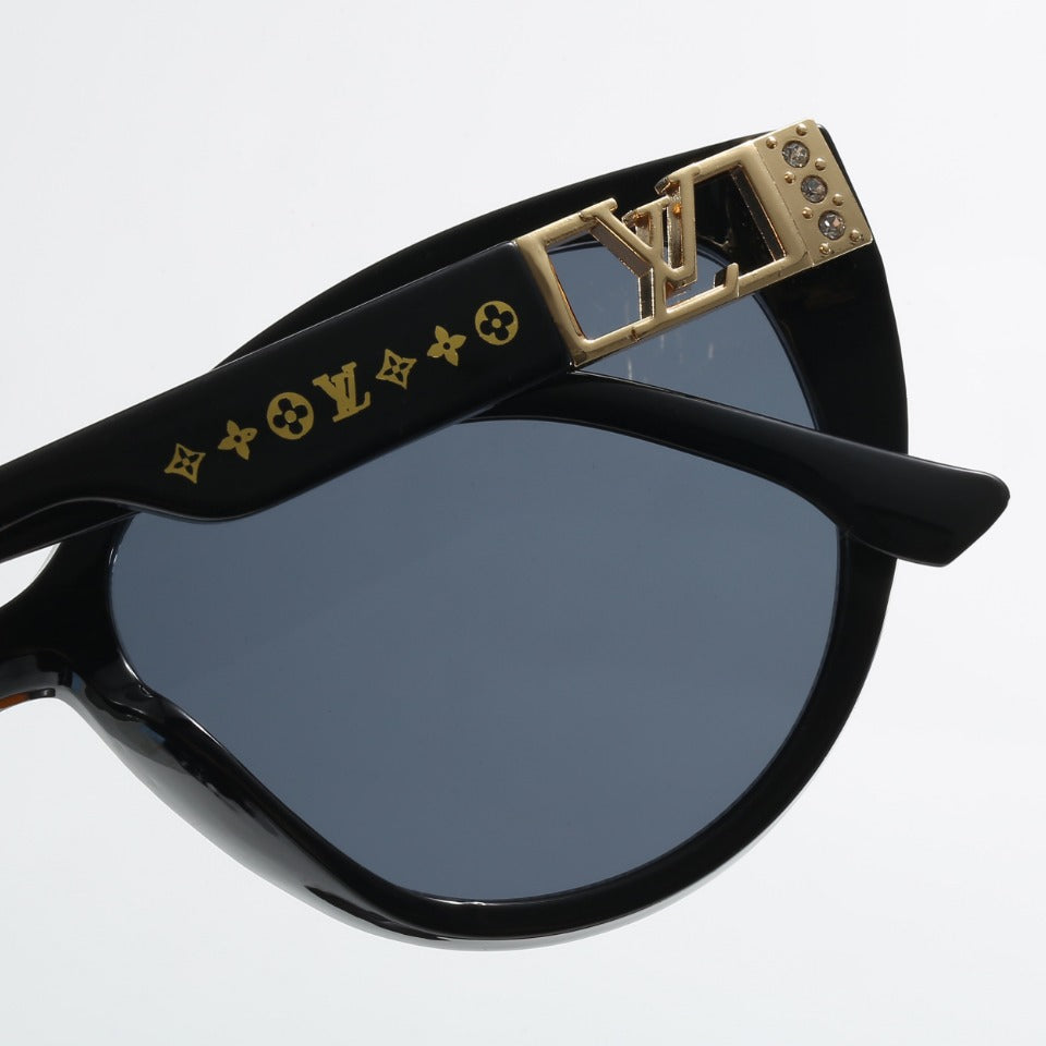 Lunettes de soleil à monture ajourée en losange