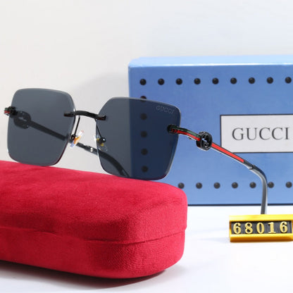 Lunettes de soleil à monture métallique rayée