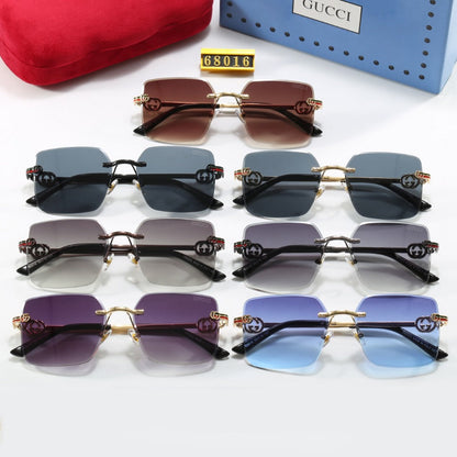 Lunettes de soleil à monture métallique rayée