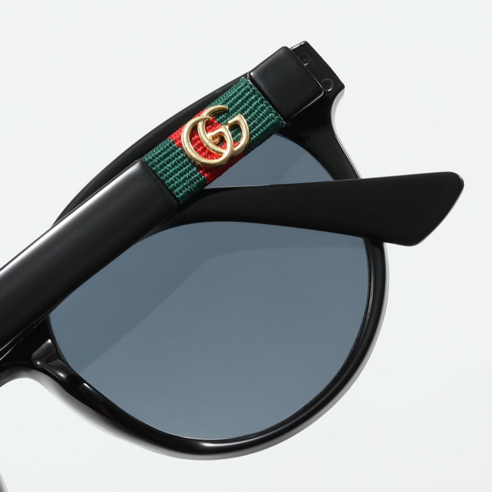 Lunettes de soleil rétro ovales en maille à rayures