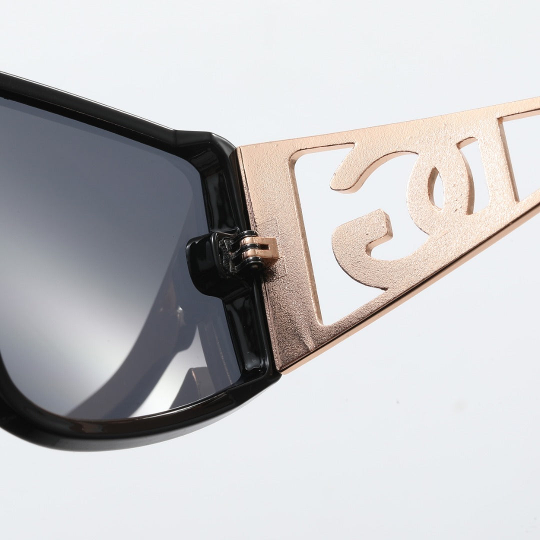 Lunettes de soleil surdimensionnées à monture métallique et tendance
