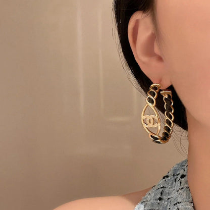 Boucles d'oreilles créoles mi-cerceau en cuir et métal tendance