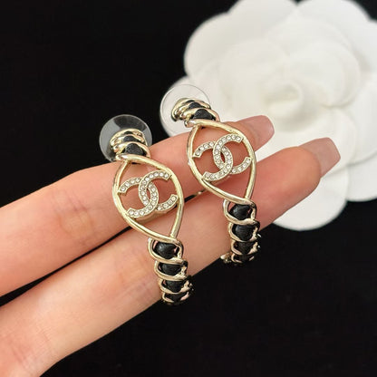 Boucles d'oreilles créoles mi-cerceau en cuir et métal tendance