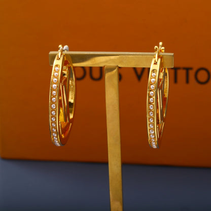 Pendientes de letra de moda